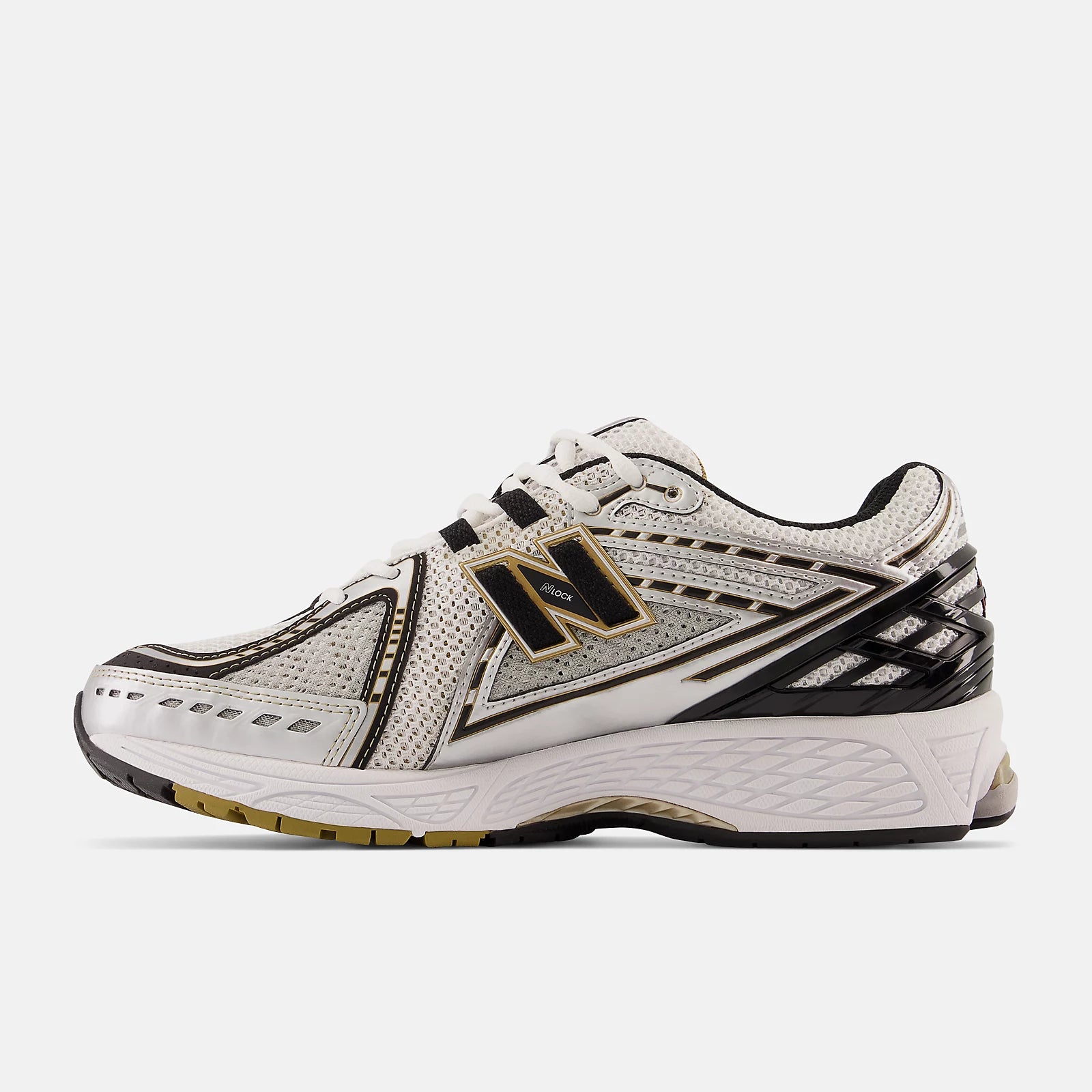New Balance 1906 silver and gold
